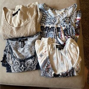 Four Women’s tops size XL